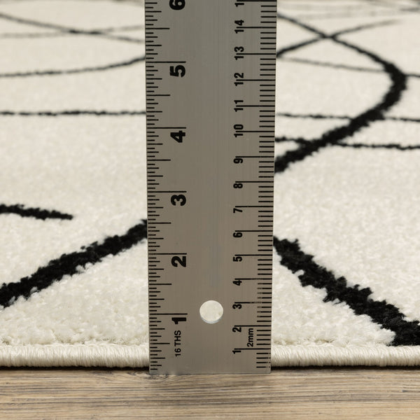 Oriental Weavers Quinn Contemporary Beige Area Rug With Bold Black Freeform Linework, Soft Frieze Pile For Comfort 83.86'' L x 62.99'' W QQUI12160213ST