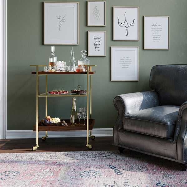 English Elm Jace Mango Wood Bar Cart 26" Cognac with Tempered Glass Shelves, Gold Metal Frame & Locking Wheels B136P158748