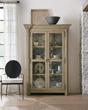 Hooker Furniture Ciao Two-Door Display Cabinet Natural Finish — European Farmhouse Charm, Beveled Glass, Burnished Brass Pulls, Adjustable Shelves 5805-75906-85