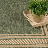 Nourison Horizon Indoor/Outdoor HOZ03 Machine Made Power-loomed Solid Border Indoor/Outdoor Modern Outdoor Rug Green, Green 88% Polypropylene,12% Polyester 841491128435