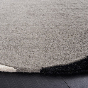 Rodeo Drive Hand Tufted Wool Cotton Rug - Luxurious Contemporary Design for Elegant Interiors