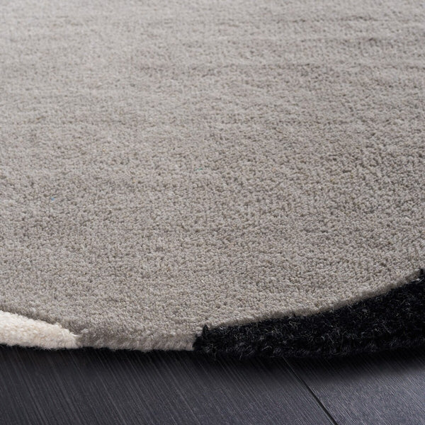 Rodeo Drive Hand Tufted Wool Cotton Rug - Luxurious Contemporary Design for Elegant Interiors