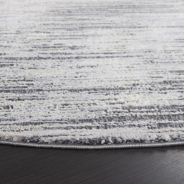 Safavieh Revive 106 Power Loomed Solid & Tonal Rug Grey 9' x 12'