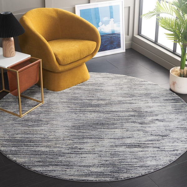 Safavieh Revive 106 Power Loomed Solid & Tonal Rug Grey 9' x 12'