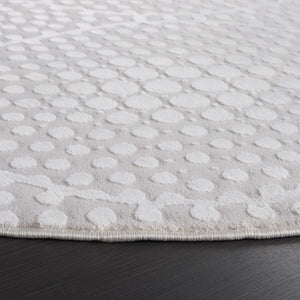 Safavieh Revive 108 Power Loomed Solid & Tonal Rug Ivory 9' x 12'