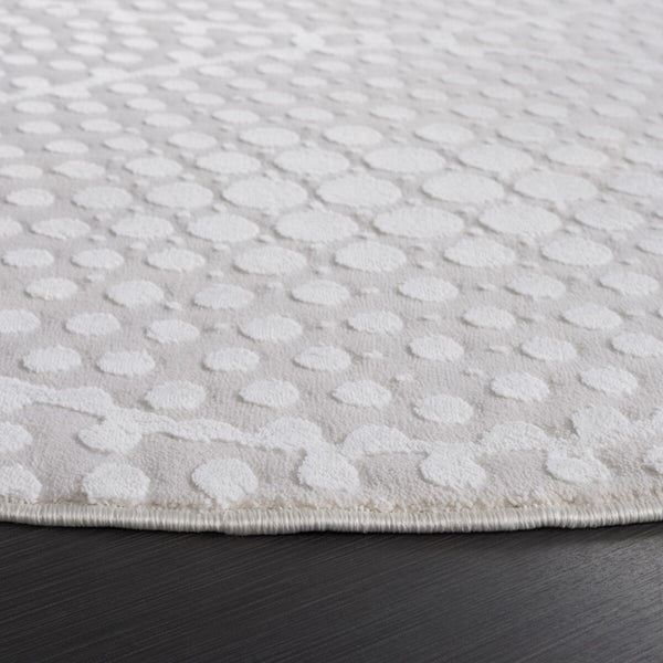 Safavieh Revive 108 Power Loomed Solid & Tonal Rug Ivory 9' x 12'