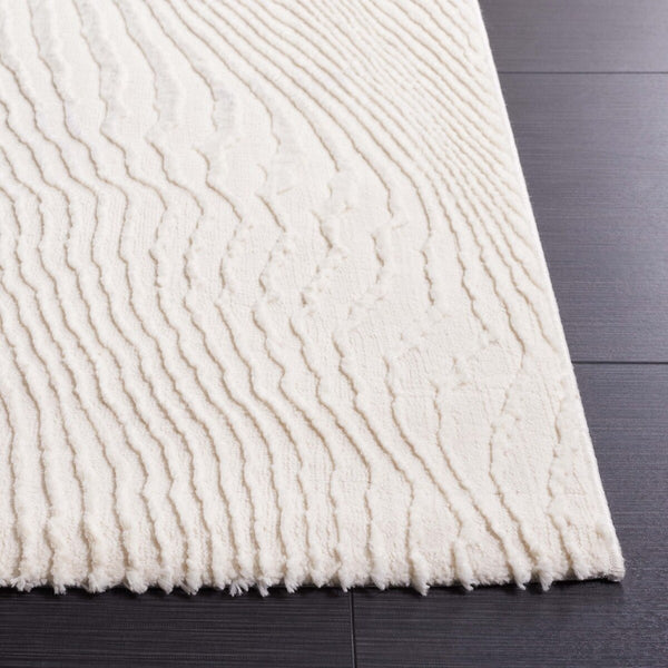 Safavieh Revive 110 Power Loomed Solid & Tonal Rug Ivory 9' x 12'