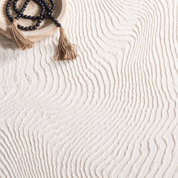 Safavieh Revive 110 Power Loomed Solid & Tonal Rug Ivory 9' x 12'