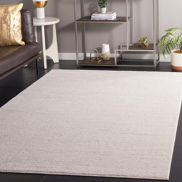 Safavieh Revive 114 Power Loomed Solid & Tonal Rug Ivory 9' x 12'