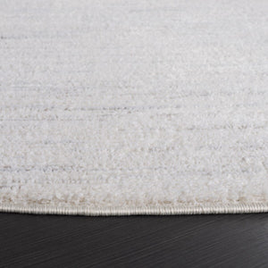 Safavieh Revive 114 Power Loomed Solid & Tonal Rug Ivory 9' x 12'