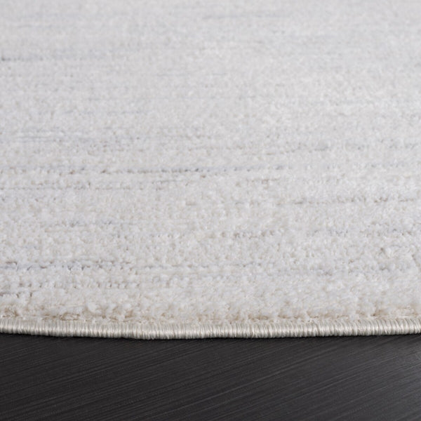 Safavieh Revive 114 Power Loomed Solid & Tonal Rug Ivory 9' x 12'