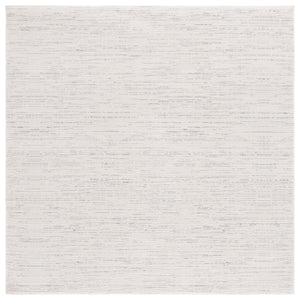 Safavieh Revive 114 Power Loomed Solid & Tonal Rug Ivory 9' x 12'