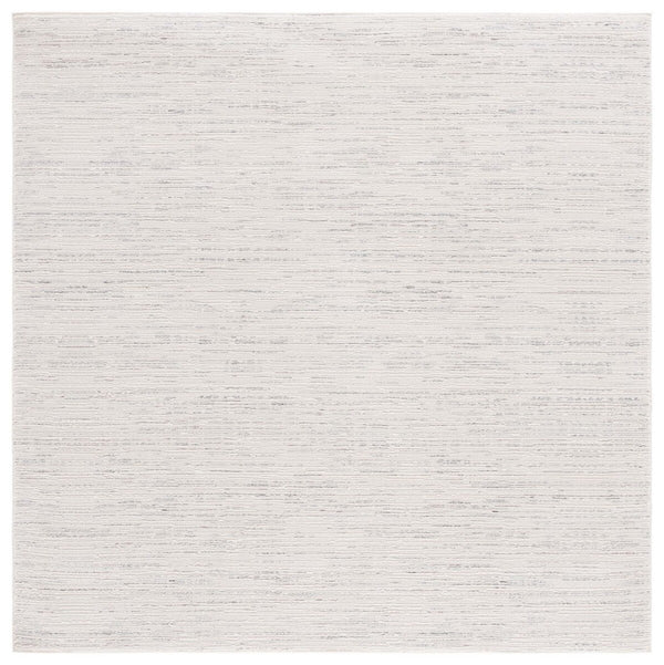 Safavieh Revive 114 Power Loomed Solid & Tonal Rug Ivory 9' x 12'