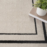 Nourison Essentials NRE02 Machine Made Power-loomed Narrow Border Indoor/Outdoor Contemporary Outdoor Rug Ivory,Black, Ivory Black 100% Polypropylene 99446148292