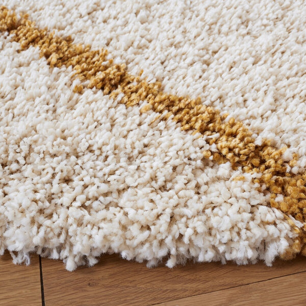 Safavieh Hudson Shag 281 Power Loomed Shag Rug Ivory / Gold SGH281E-2