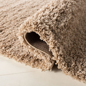 Safavieh Laguna Shag 303 Power Loomed Rug Sand 2'-3" x 4'