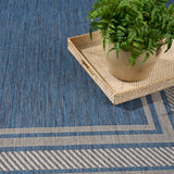 Nourison Horizon Indoor/Outdoor HOZ03 Machine Made Power-loomed Solid Border Indoor/Outdoor Modern Outdoor Rug Denim, Denim 88% Polypropylene,12% Polyester 841491128671