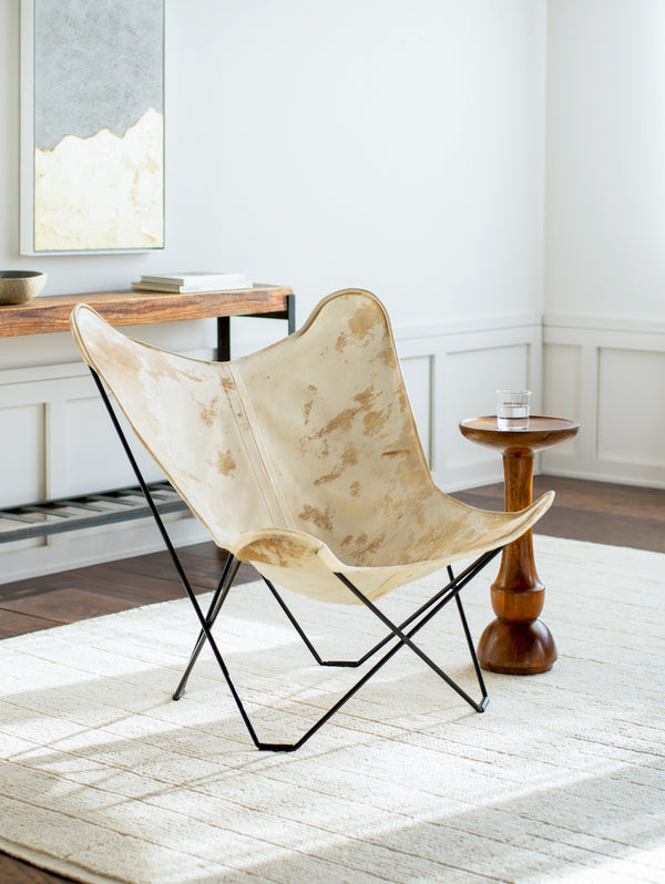 Nizhoni ZHO-001 35"H x 31"W x 31"D Lounger ZHO-001  Upholstery: CamelTop: Camel; Base: Black Surya