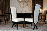 Two 43.5' White Leatherette and Black Wood Dining Chairs with X Shaped Rear Legs