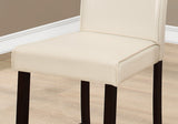 Two 40" Ivory Leather Look Solid Wood and MDF Counter Height Dining Chairs