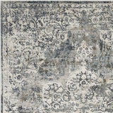 8'x11' Ivory Machine Woven Distressed Diamond Floral Medallion Indoor Area Rug