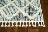 7'x10' Ivory Hand Woven Wool And Jute Indoor Area Rug