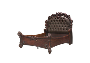 King Size Elaborately Carved Cherry Wood Finish Bed with Tufted Dark Faux Leather Headboard