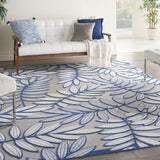 7’ x 10' Ivory and Navy Leaves Indoor Outdoor Area Rug