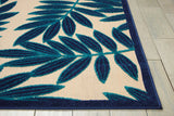 5’ x 8’ Navy and Beige Leaves Indoor Outdoor Area Rug