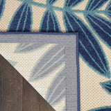 7’ x 10’ Navy and Beige Leaves Indoor Outdoor Area Rug