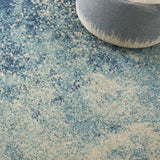 5’ x 7’ Light Blue and Ivory Abstract Sky Area Rug