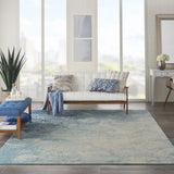 7’ x 10’ Light Blue and Ivory Abstract Sky Area Rug