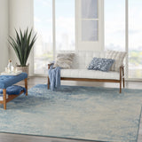 7’ x 10’ Light Blue and Ivory Abstract Sky Area Rug