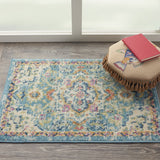 2’ x 3’ Light Blue and Ivory Distressed Scatter Rug