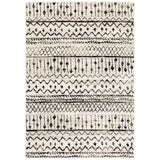 5’ x 7’ Ivory and Black Eclectic Patterns Indoor Area Rug