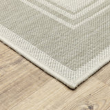 8’x10’ Ivory and Gray Bordered Indoor Outdoor Area Rug