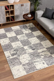 5’ Round White and Gray Checkered Area Rug