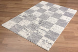 5’ Round White and Gray Checkered Area Rug