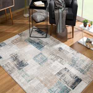 4’ x 6’ Blue and Ivory Distressed Diamonds Area Rug