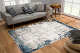 4’ x 6’ Blue and Ivory Modern Abstract Area Rug