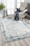 Ivory and Blue Abstract Distressed Area Rug