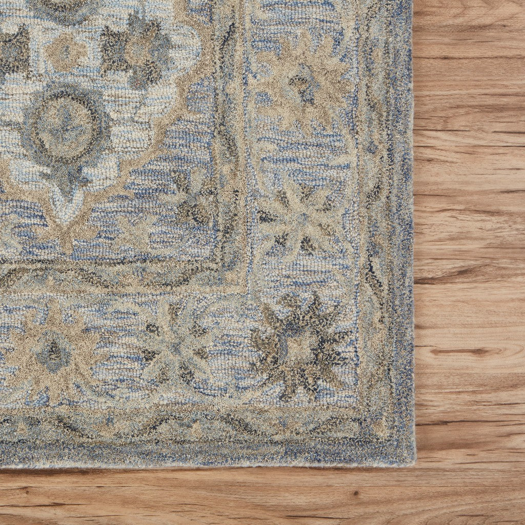 9’ x 12’ Blue and Tan Traditional Area Rug