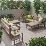Noble House Cape Coral Outdoor 6 Seater Aluminum Sofa and Ottoman Set with Side Tables, Silver and Khaki