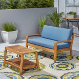 Grenada Loveseat and Coffee Table Set for Patio, Acacia Wood, Teak Finish with Blue Outdoor Cushions Noble House