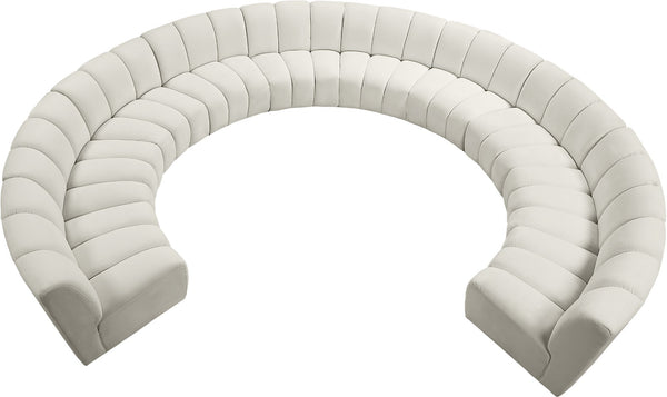 Infinity Velvet / Engineered Wood / Foam Contemporary Cream Velvet 10pc. Modular Sectional - 183" W x 157" D x 33" H