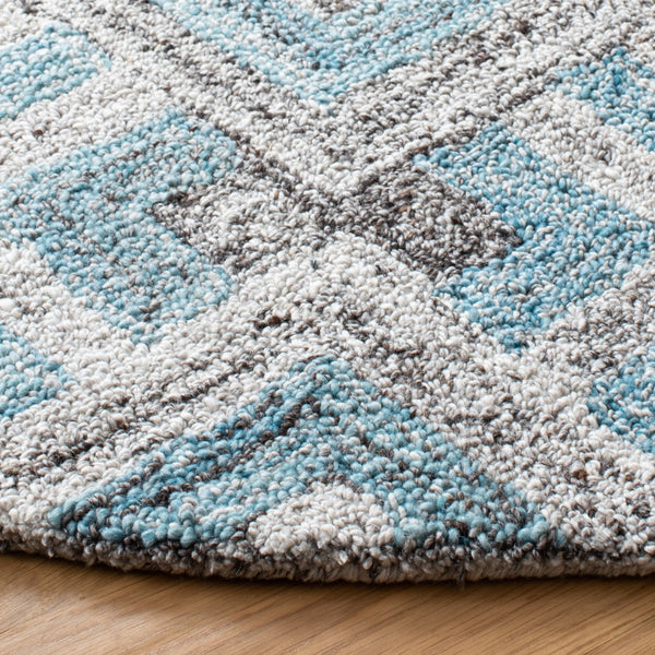 Safavieh Abstract 642 Hand Tufted Wool 65%, Viscose, 25%, Nylon 10% Rug Grey / Turquoise 9' x 12'