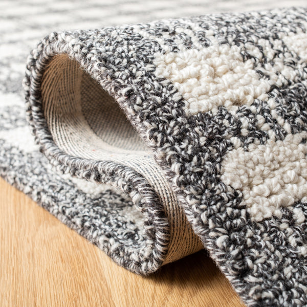 Safavieh Abstract 648 Hand Tufted Wool 65%, Viscose, 25%, Nylon 10% Rug Ivory / Black 9' x 12'