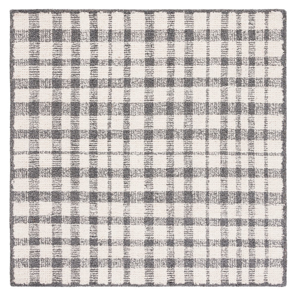 Safavieh Abstract 648 Hand Tufted Wool 65%, Viscose, 25%, Nylon 10% Rug Ivory / Black 9' x 12'