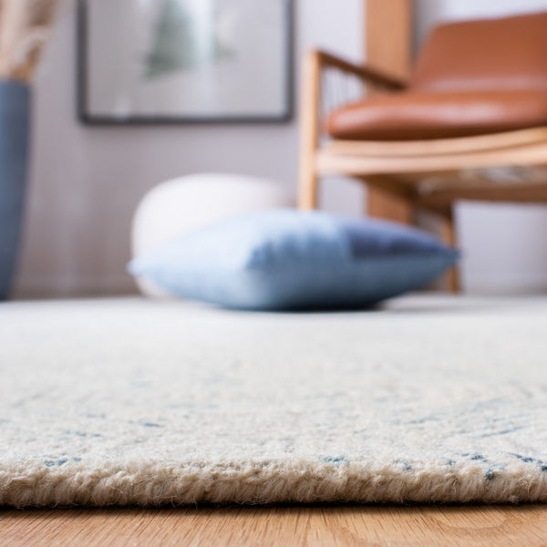 Abstract 654 Contemporary Hand Tufted 80% Wool, 20% Cotton Rug Ivory / Light Blue