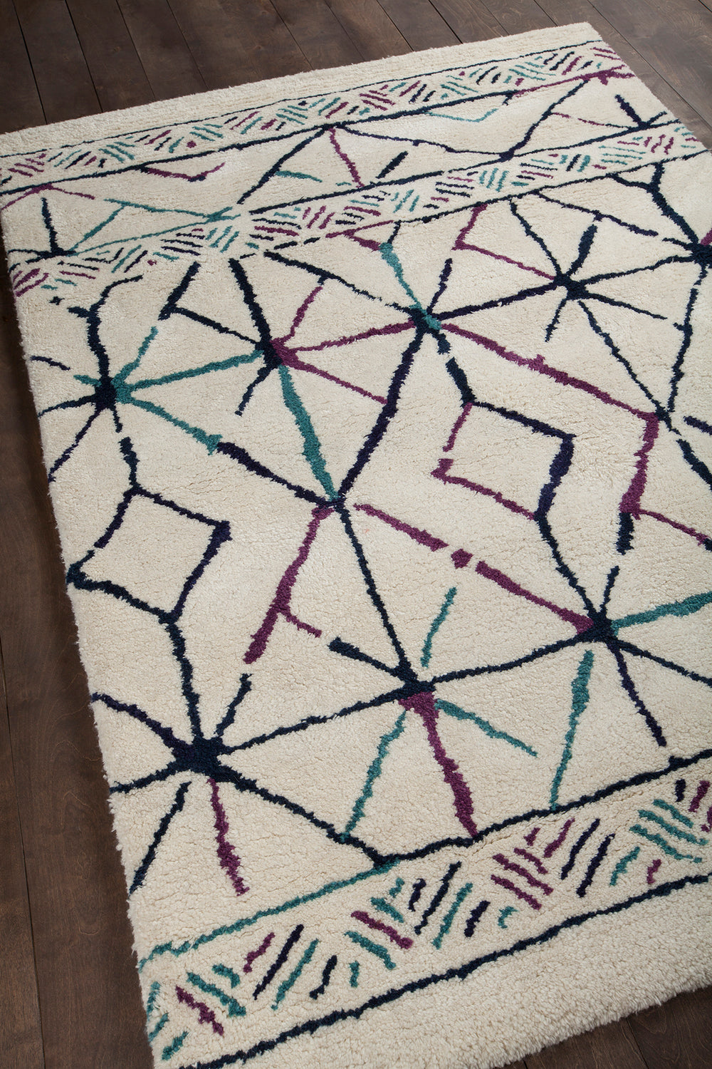 Chandra Rugs Arcon 100 % Wool Hand-Woven Contemporary Shag Rug Cream/Red/Blue/Black 7'9 x 10'6